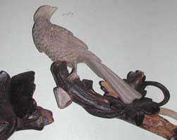 Clock wood carving, bird